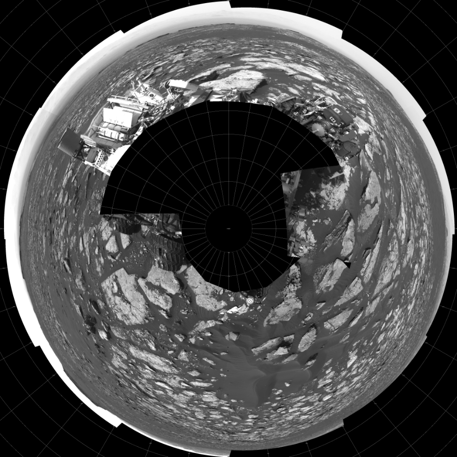 NASA's Mars rover Curiosity took 18 images in Gale Crater using its mast-mounted Left Navigation Camera (Navcam) to create this mosaic. The seam-corrected mosaic provides a polar stereographic projection panorama of the Martian surface with 0 degrees azimuth (measured clockwise from north) at the top of the image. Curiosity took the images on November 16, 2016, Sol 1521 of the Mars Science Laboratory mission at drive 2668, site number 59. The local mean solar time for the image exposures was 2 PM. Each Navcam image has a 45-degree field of view. CREDIT: NASA/JPL-Caltech