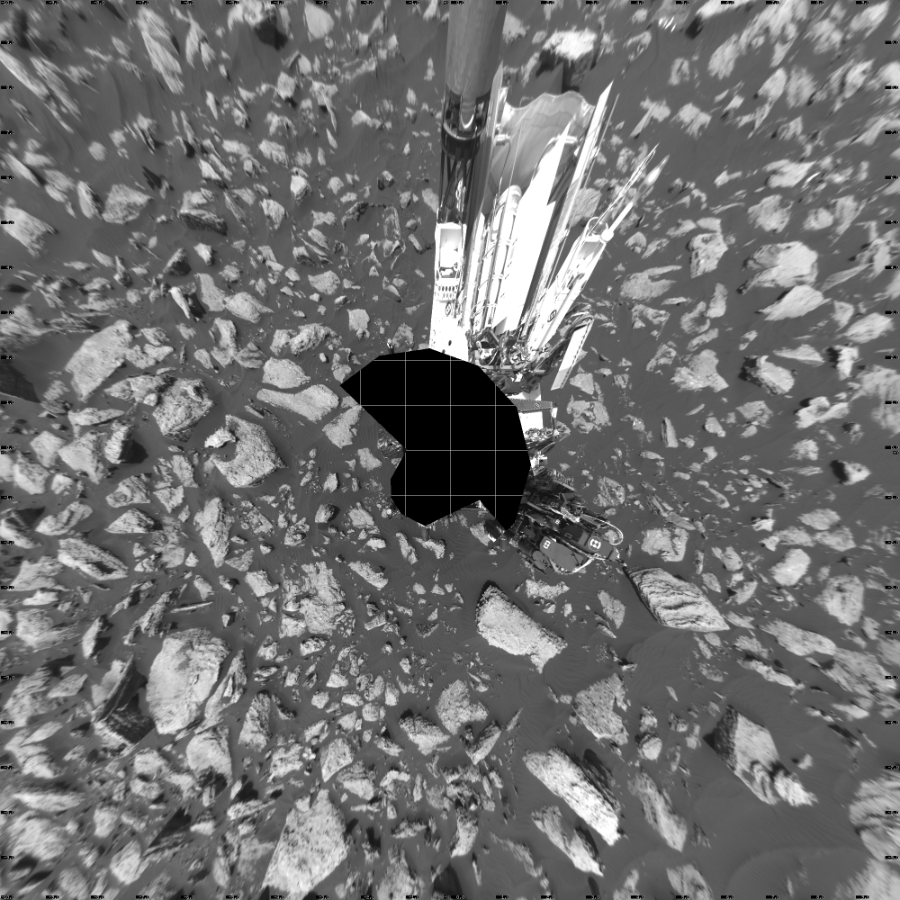 NASA's Mars rover Curiosity took 17 images in Gale Crater using its mast-mounted Left Navigation Camera (Navcam) to create this mosaic. The seam-corrected mosaic provides a vertical projection of the Martian surface near the rover, covering an area of 20 meters (north/south) by 20 meters (east/west). North is up in the image. This projection provides an overhead view, but introduces distortion for items not on the surface, such as large rocks and the rover itself.  Curiosity took the images on January 23, 2017, Sol 1587 of the Mars Science Laboratory mission at drive 2010, site number 60. The local mean solar time for the image exposures was from 2 PM to 3 PM. Each Navcam image has a 45-degree field of view. CREDIT: NASA/JPL-Caltech