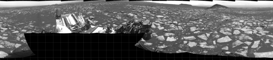 NASA's Mars rover Curiosity took 17 images in Gale Crater using its mast-mounted Left Navigation Camera (Navcam) to create this mosaic. The seam-corrected mosaic provides a 360-degree cylindrical projection panorama of the Martian surface centered at 180 degrees azimuth (measured clockwise from north). Curiosity took the images on January 30, 2017, Sol 1594 of the Mars Science Laboratory mission at drive 2574, site number 60. The local mean solar time for the image exposures was from 1 PM to 3 PM. Each Navcam image has a 45 degree field of view. CREDIT: NASA/JPL-Caltech