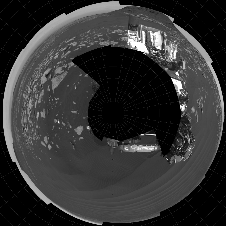 NASA's Mars rover Curiosity took 18 images in Gale Crater using its mast-mounted Left Navigation Camera (Navcam) to create this mosaic. The seam-corrected mosaic provides a polar stereographic projection panorama of the Martian surface with 0 degrees azimuth (measured clockwise from north) at the top of the image. Curiosity took the images on February 06, 2017, Sol 1601 of the Mars Science Laboratory mission at drive 3162, site number 60. The local mean solar time for the image exposures was 1 PM. Each Navcam image has a 45-degree field of view. CREDIT: NASA/JPL-Caltech