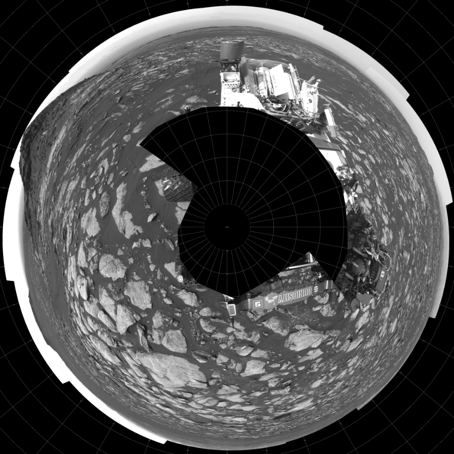 NASA's Mars rover Curiosity took 17 images in Gale Crater using its mast-mounted Left Navigation Camera (Navcam) to create this mosaic. The seam-corrected mosaic provides a polar stereographic projection panorama of the Martian surface with 0 degrees azimuth (measured clockwise from north) at the top of the image. Curiosity took the images on February 15, 2017, Sol 1610 of the Mars Science Laboratory mission at drive 456, site number 61. The local mean solar time for the image exposures was from 2 PM to 3 PM. Each Navcam image has a 45-degree field of view. CREDIT: NASA/JPL-Caltech