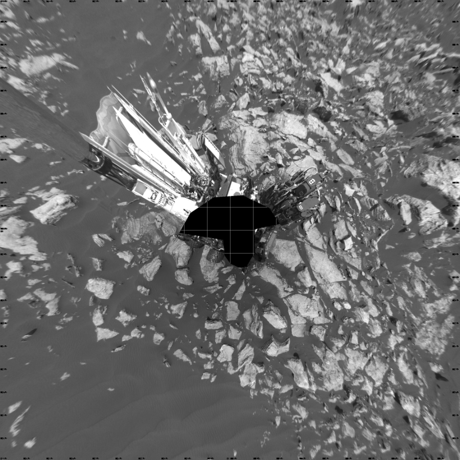 NASA's Mars rover Curiosity took 19 images in Gale Crater using its mast-mounted Left Navigation Camera (Navcam) to create this mosaic. The seam-corrected mosaic provides a vertical projection of the Martian surface near the rover, covering an area of 20 meters (north/south) by 20 meters (east/west). North is up in the image. This projection provides an overhead view, but introduces distortion for items not on the surface, such as large rocks and the rover itself.  Curiosity took the images on February 22, 2017, Sol 1616 of the Mars Science Laboratory mission at drive 934, site number 61. The local mean solar time for the image exposures was 1 PM. Each Navcam image has a 45-degree field of view. CREDIT: NASA/JPL-Caltech