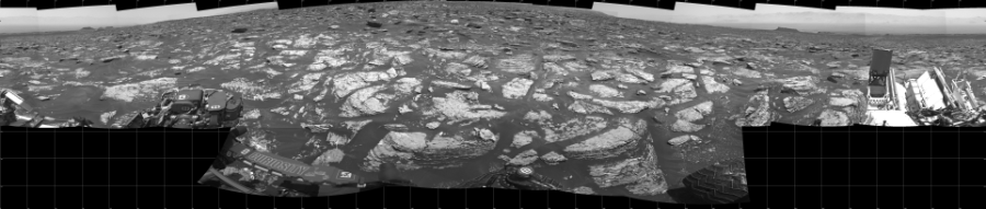 NASA's Mars rover Curiosity took 17 images in Gale Crater using its mast-mounted Left Navigation Camera (Navcam) to create this mosaic. The seam-corrected mosaic provides a 360-degree cylindrical projection panorama of the Martian surface centered at 180 degrees azimuth (measured clockwise from north). Curiosity took the images on June 05, 2017, Sol 1717 of the Mars Science Laboratory mission at drive 2372, site number 63. The local mean solar time for the image exposures was 1 PM. Each Navcam image has a 45 degree field of view. CREDIT: NASA/JPL-Caltech