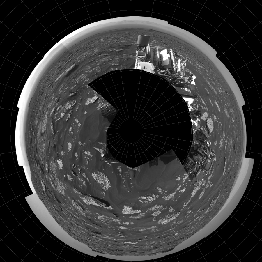 NASA's Mars rover Curiosity took 21 images in Gale Crater using its mast-mounted Left Navigation Camera (Navcam) to create this mosaic. The seam-corrected mosaic provides a polar stereographic projection panorama of the Martian surface with 0 degrees azimuth (measured clockwise from north) at the top of the image. Curiosity took the images on July 13, 2017, Sol 1754 of the Mars Science Laboratory mission at drive 2790, site number 64. The local mean solar time for the image exposures was from 2 PM to 4 PM. Each Navcam image has a 45-degree field of view. CREDIT: NASA/JPL-Caltech