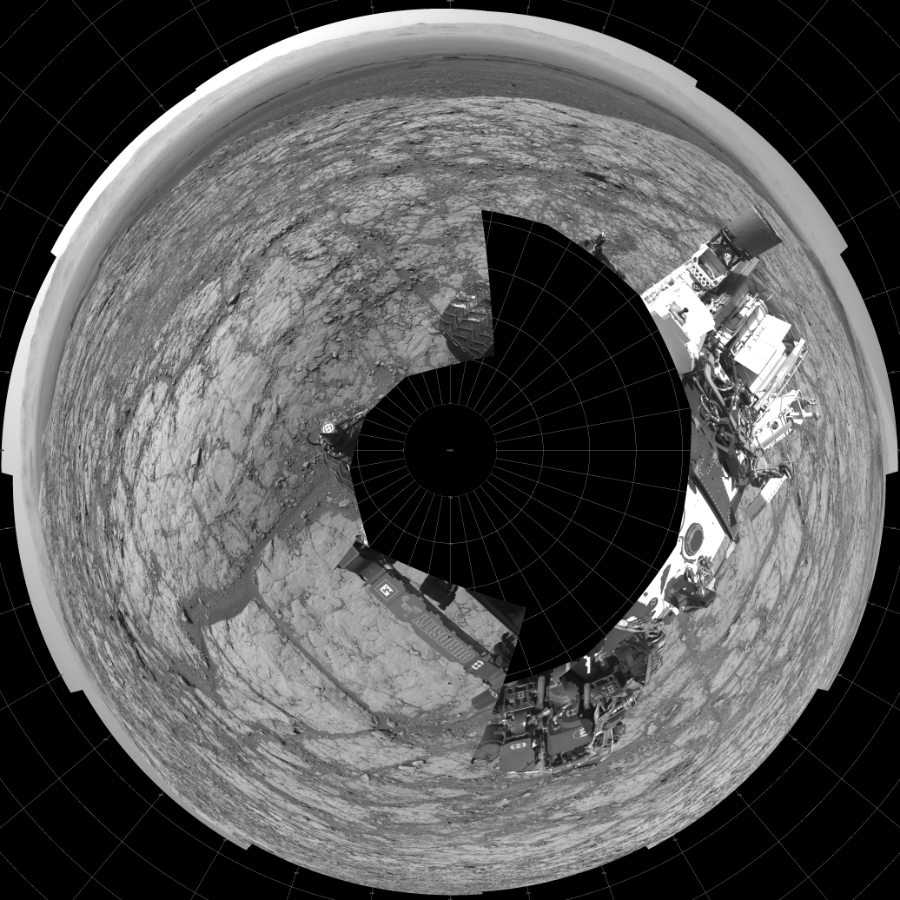 NASA's Mars rover Curiosity took 17 images in Gale Crater using its mast-mounted Left Navigation Camera (Navcam) to create this mosaic. The seam-corrected mosaic provides a polar stereographic projection panorama of the Martian surface with 0 degrees azimuth (measured clockwise from north) at the top of the image. Curiosity took the images on September 18, 2017, Sol 1819 of the Mars Science Laboratory mission at drive 246, site number 66. The local mean solar time for the image exposures was 2 PM. Each Navcam image has a 45-degree field of view. CREDIT: NASA/JPL-Caltech