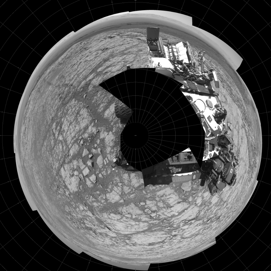 NASA's Mars rover Curiosity took 17 images in Gale Crater using its mast-mounted Left Navigation Camera (Navcam) to create this mosaic. The seam-corrected mosaic provides a polar stereographic projection panorama of the Martian surface with 0 degrees azimuth (measured clockwise from north) at the top of the image. Curiosity took the images on October 07, 2017, Sol 1837 of the Mars Science Laboratory mission at drive 1332, site number 66. The local mean solar time for the image exposures was 1 PM. Each Navcam image has a 45-degree field of view. CREDIT: NASA/JPL-Caltech