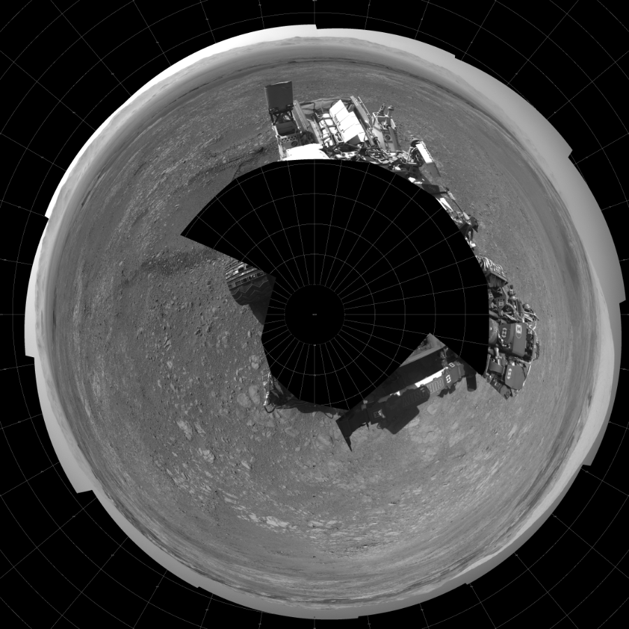 NASA's Mars rover Curiosity took 17 images in Gale Crater using its mast-mounted Left Navigation Camera (Navcam) to create this mosaic. The seam-corrected mosaic provides a polar stereographic projection panorama of the Martian surface with 0 degrees azimuth (measured clockwise from north) at the top of the image. Curiosity took the images on December 04, 2017, Sol 1894 of the Mars Science Laboratory mission at drive 806, site number 67. The local mean solar time for the image exposures was 2 PM. Each Navcam image has a 45-degree field of view. CREDIT: NASA/JPL-Caltech
