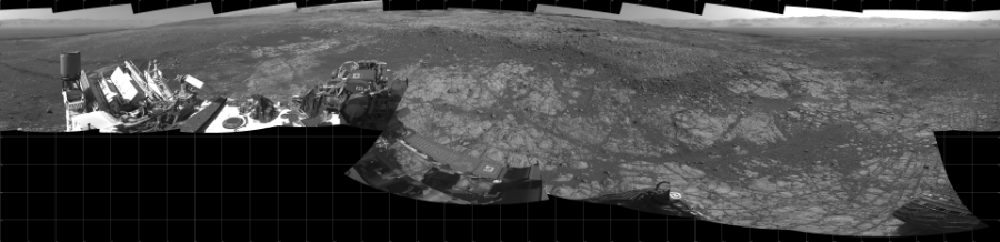 NASA's Mars rover Curiosity took 17 images in Gale Crater using its mast-mounted Left Navigation Camera (Navcam) to create this mosaic. The seam-corrected mosaic provides a 360-degree cylindrical projection panorama of the Martian surface centered at 180 degrees azimuth (measured clockwise from north). Curiosity took the images on December 14, 2017, Sol 1903 of the Mars Science Laboratory mission at drive 1358, site number 67. The local mean solar time for the image exposures was from 2 PM to 3 PM. Each Navcam image has a 45 degree field of view. CREDIT: NASA/JPL-Caltech