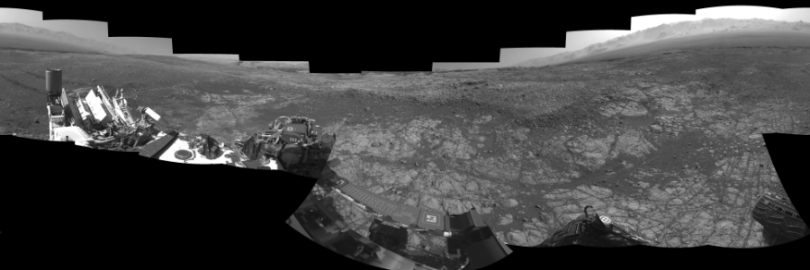 NASA's Mars rover Curiosity took 17 images in Gale Crater using its mast-mounted Left Navigation Camera (Navcam) to create this mosaic. The seam-corrected mosaic provides a 360-degree cylindrical-perspective projection panorama of the Martian surface suitable for stereo viewing, centered at 344 degrees azimuth (measured clockwise from north). This single-eye view must be combined with the partner right image to be viewed in stereo.  Curiosity took the images on December 14, 2017, Sol 1903 of the Mars Science Laboratory mission at drive 1358, site number 67. The local mean solar time for the image exposures was from 2 PM to 3 PM. Each Navcam image has a 45-degree field of view. CREDIT: NASA/JPL-Caltech