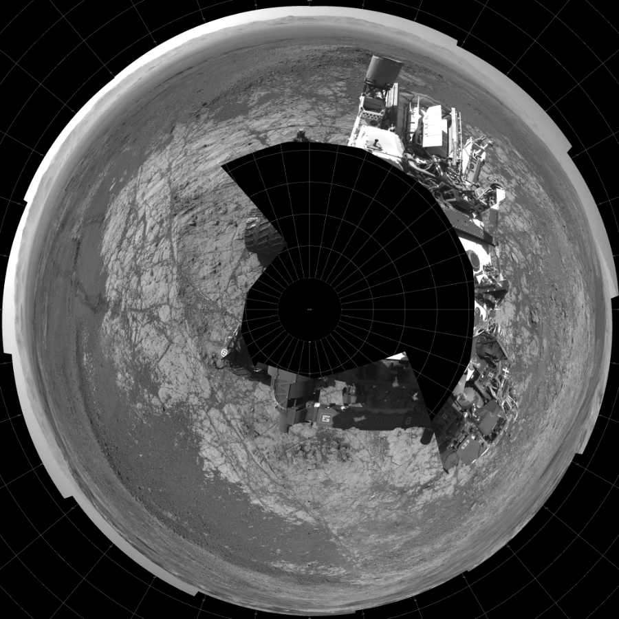 NASA's Mars rover Curiosity took 18 images in Gale Crater using its mast-mounted Left Navigation Camera (Navcam) to create this mosaic. The seam-corrected mosaic provides a polar stereographic projection panorama of the Martian surface with 0 degrees azimuth (measured clockwise from north) at the top of the image. Curiosity took the images on January 10, 2018, Sol 1930 of the Mars Science Laboratory mission at drive 2420, site number 67. The local mean solar time for the image exposures was 2 PM. Each Navcam image has a 45-degree field of view. CREDIT: NASA/JPL-Caltech