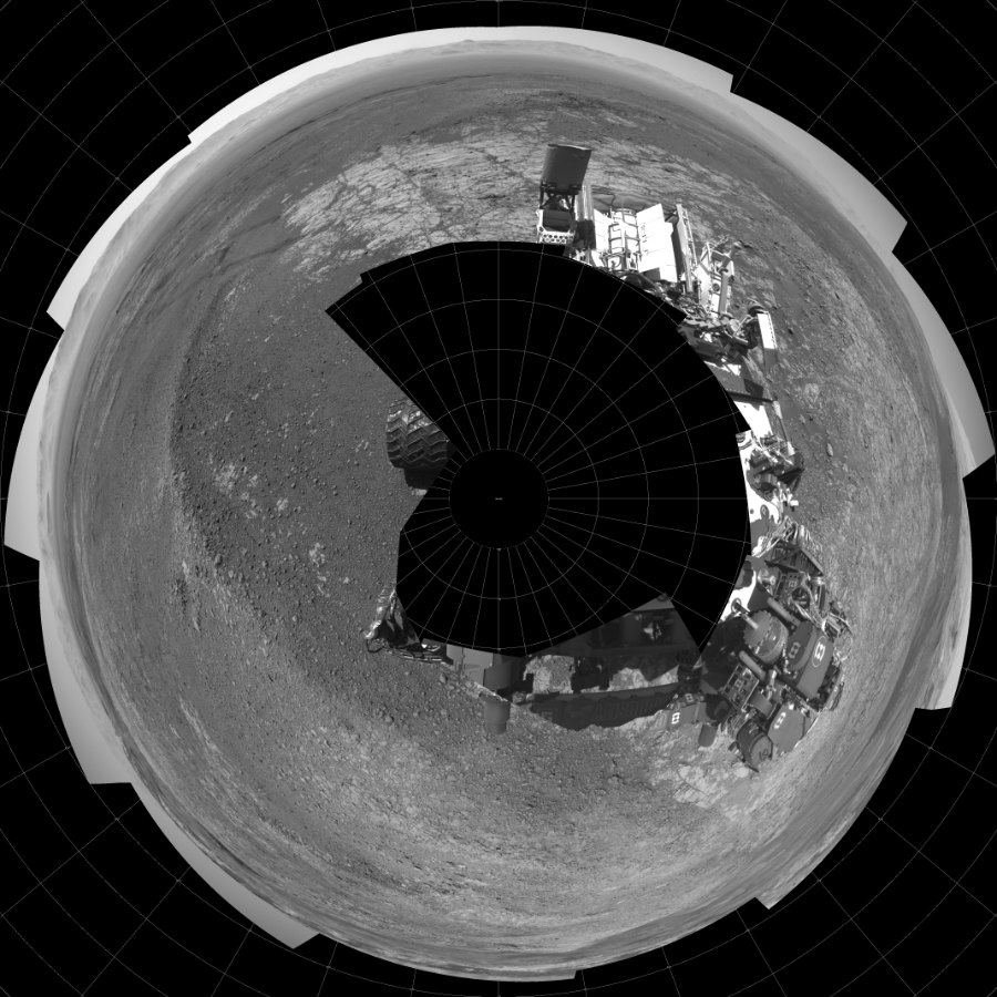 NASA's Mars rover Curiosity took 19 images in Gale Crater using its mast-mounted Left Navigation Camera (Navcam) to create this mosaic. The seam-corrected mosaic provides a polar stereographic projection panorama of the Martian surface with 0 degrees azimuth (measured clockwise from north) at the top of the image. Curiosity took the images on January 19, 2018, Sol 1939 of the Mars Science Laboratory mission at drive 2478, site number 67. The local mean solar time for the image exposures was from 1 PM to 2 PM. Each Navcam image has a 45-degree field of view. CREDIT: NASA/JPL-Caltech