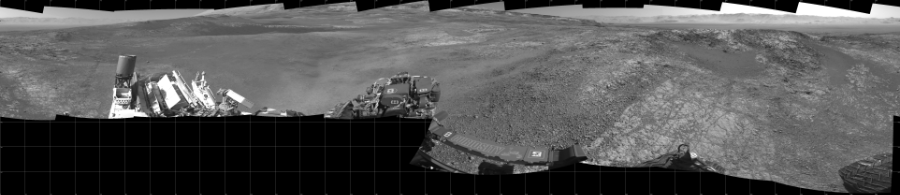 NASA's Mars rover Curiosity took 17 images in Gale Crater using its mast-mounted Left Navigation Camera (Navcam) to create this mosaic. The seam-corrected mosaic provides a 360-degree cylindrical projection panorama of the Martian surface centered at 180 degrees azimuth (measured clockwise from north). Curiosity took the images on January 25, 2018, Sol 1944 of the Mars Science Laboratory mission at drive 2884, site number 67. The local mean solar time for the image exposures was from 1 PM to 2 PM. Each Navcam image has a 45 degree field of view. CREDIT: NASA/JPL-Caltech
