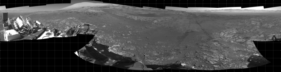 NASA's Mars rover Curiosity took 18 images in Gale Crater using its mast-mounted Left Navigation Camera (Navcam) to create this mosaic. The seam-corrected mosaic provides a 360-degree cylindrical projection panorama of the Martian surface centered at 180 degrees azimuth (measured clockwise from north). Curiosity took the images on January 30, 2018, Sol 1949 of the Mars Science Laboratory mission at drive 0, site number 68. The local mean solar time for the image exposures was 2 PM. Each Navcam image has a 45 degree field of view. CREDIT: NASA/JPL-Caltech