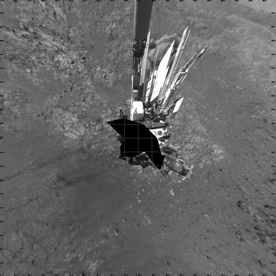 NASA's Mars rover Curiosity took 18 images in Gale Crater using its mast-mounted Left Navigation Camera (Navcam) to create this mosaic. The seam-corrected mosaic provides a vertical projection of the Martian surface near the rover, covering an area of 20 meters (north/south) by 20 meters (east/west). North is up in the image. This projection provides an overhead view, but introduces distortion for items not on the surface, such as large rocks and the rover itself.  Curiosity took the images on January 30, 2018, Sol 1949 of the Mars Science Laboratory mission at drive 0, site number 68. The local mean solar time for the image exposures was 2 PM. Each Navcam image has a 45-degree field of view. CREDIT: NASA/JPL-Caltech