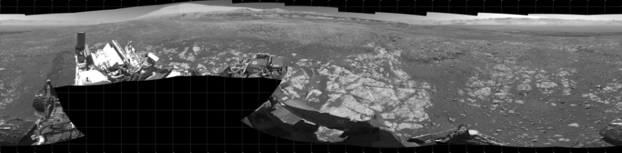 NASA's Mars rover Curiosity took 19 images in Gale Crater using its mast-mounted Left Navigation Camera (Navcam) to create this mosaic. The seam-corrected mosaic provides a 360-degree cylindrical projection panorama of the Martian surface centered at 180 degrees azimuth (measured clockwise from north). Curiosity took the images on February 12, 2018, Sol 1962 of the Mars Science Laboratory mission at drive 580, site number 68. The local mean solar time for the image exposures was from 1 PM to 12 PM. Each Navcam image has a 45 degree field of view. CREDIT: NASA/JPL-Caltech