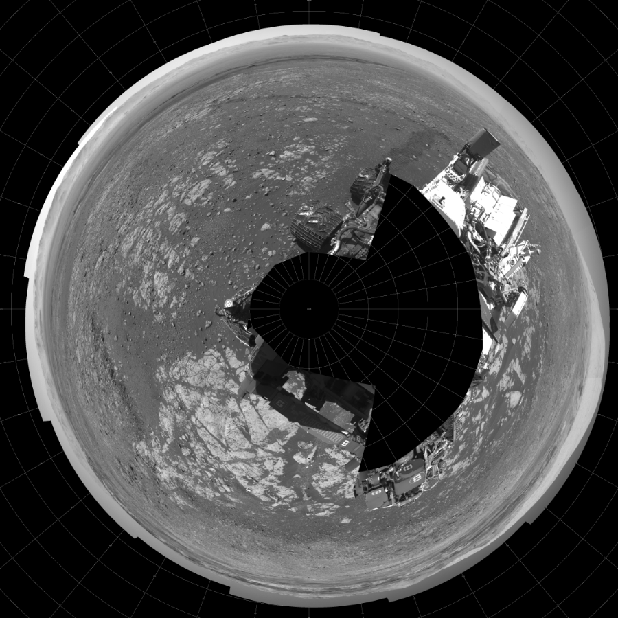 NASA's Mars rover Curiosity took 19 images in Gale Crater using its mast-mounted Left Navigation Camera (Navcam) to create this mosaic. The seam-corrected mosaic provides a polar stereographic projection panorama of the Martian surface with 0 degrees azimuth (measured clockwise from north) at the top of the image. Curiosity took the images on February 12, 2018, Sol 1962 of the Mars Science Laboratory mission at drive 580, site number 68. The local mean solar time for the image exposures was from 1 PM to 12 PM. Each Navcam image has a 45-degree field of view. CREDIT: NASA/JPL-Caltech
