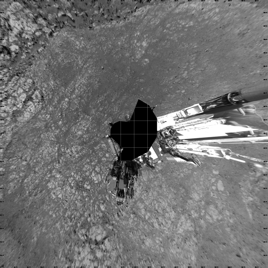 NASA's Mars rover Curiosity took 17 images in Gale Crater using its mast-mounted Left Navigation Camera (Navcam) to create this mosaic. The seam-corrected mosaic provides a vertical projection of the Martian surface near the rover, covering an area of 20 meters (north/south) by 20 meters (east/west). North is up in the image. This projection provides an overhead view, but introduces distortion for items not on the surface, such as large rocks and the rover itself.  Curiosity took the images on March 19, 2018, Sol 1996 of the Mars Science Laboratory mission at drive 2396, site number 68. The local mean solar time for the image exposures was 2 PM. Each Navcam image has a 45-degree field of view. CREDIT: NASA/JPL-Caltech
