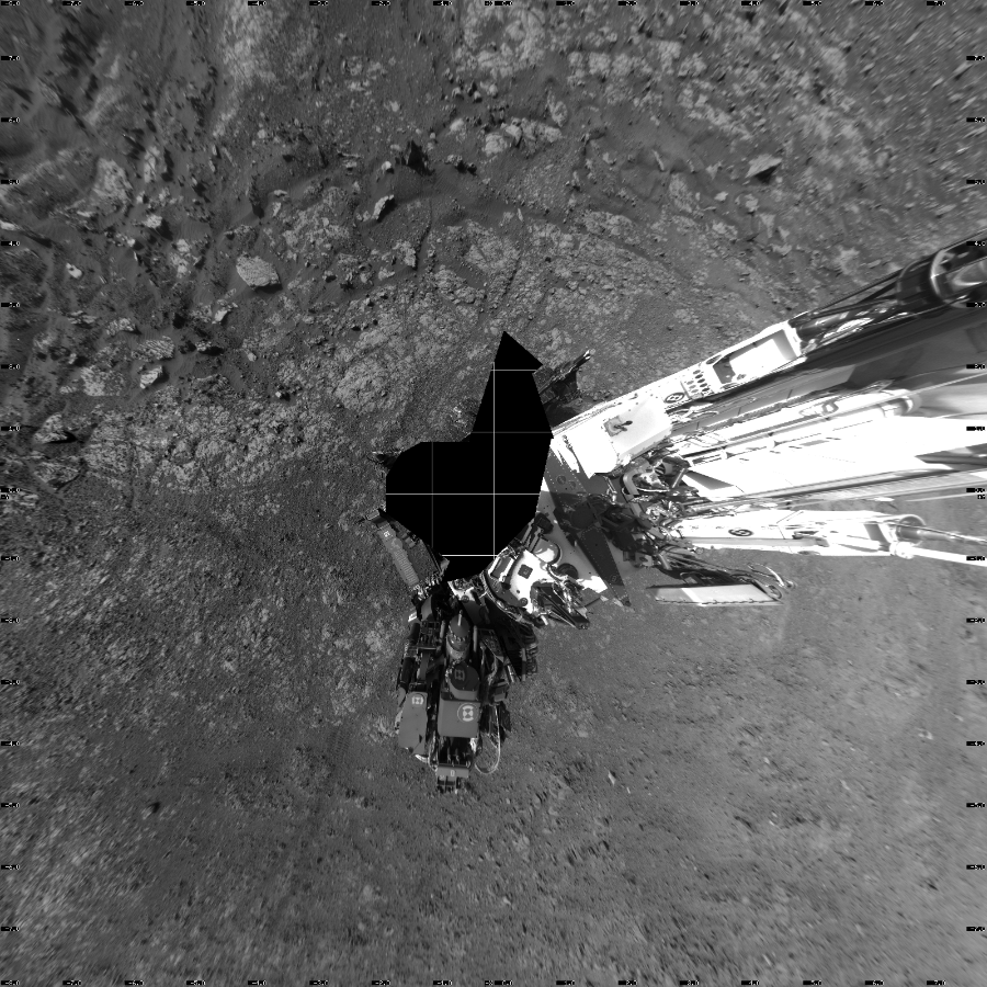 NASA's Mars rover Curiosity took 17 images in Gale Crater using its mast-mounted Left Navigation Camera (Navcam) to create this mosaic. The seam-corrected mosaic provides a vertical projection of the Martian surface near the rover, covering an area of 16 meters (north/south) by 16 meters (east/west). North is up in the image. This projection provides an overhead view, but introduces distortion for items not on the surface, such as large rocks and the rover itself.  Curiosity took the images on March 21, 2018, Sol 1998 of the Mars Science Laboratory mission at drive 2484, site number 68. The local mean solar time for the image exposures was 3 PM. Each Navcam image has a 45-degree field of view. CREDIT: NASA/JPL-Caltech