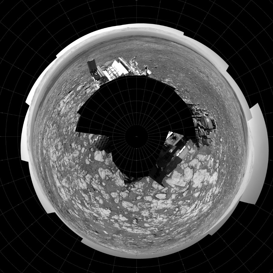 NASA's Mars rover Curiosity took 18 images in Gale Crater using its mast-mounted Left Navigation Camera (Navcam) to create this mosaic. The seam-corrected mosaic provides a polar stereographic projection panorama of the Martian surface with 0 degrees azimuth (measured clockwise from north) at the top of the image. Curiosity took the images on March 22, 2018, Sols 1999-2000 of the Mars Science Laboratory mission at drive 2626, site number 68. The local mean solar time for the image exposures was from 1 PM to 11 AM. Each Navcam image has a 45-degree field of view. CREDIT: NASA/JPL-Caltech