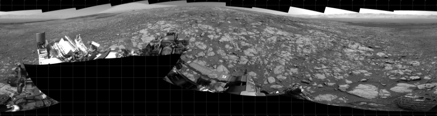 NASA's Mars rover Curiosity took 19 images in Gale Crater using its mast-mounted Left Navigation Camera (Navcam) to create this mosaic. The seam-corrected mosaic provides a 360-degree cylindrical projection panorama of the Martian surface centered at 180 degrees azimuth (measured clockwise from north). Curiosity took the images on March 26, 2018, Sol 2003 of the Mars Science Laboratory mission at drive 0, site number 69. The local mean solar time for the image exposures was 2 PM. Each Navcam image has a 45 degree field of view. CREDIT: NASA/JPL-Caltech
