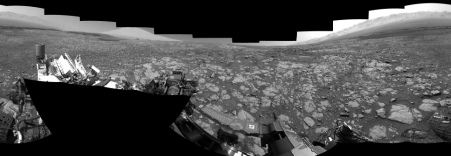 NASA's Mars rover Curiosity took 19 images in Gale Crater using its mast-mounted Left Navigation Camera (Navcam) to create this mosaic. The seam-corrected mosaic provides a 360-degree cylindrical-perspective projection panorama of the Martian surface suitable for stereo viewing, centered at 335 degrees azimuth (measured clockwise from north). This single-eye view must be combined with the partner right image to be viewed in stereo.  Curiosity took the images on March 26, 2018, Sol 2003 of the Mars Science Laboratory mission at drive 0, site number 69. The local mean solar time for the image exposures was 2 PM. Each Navcam image has a 45-degree field of view. CREDIT: NASA/JPL-Caltech