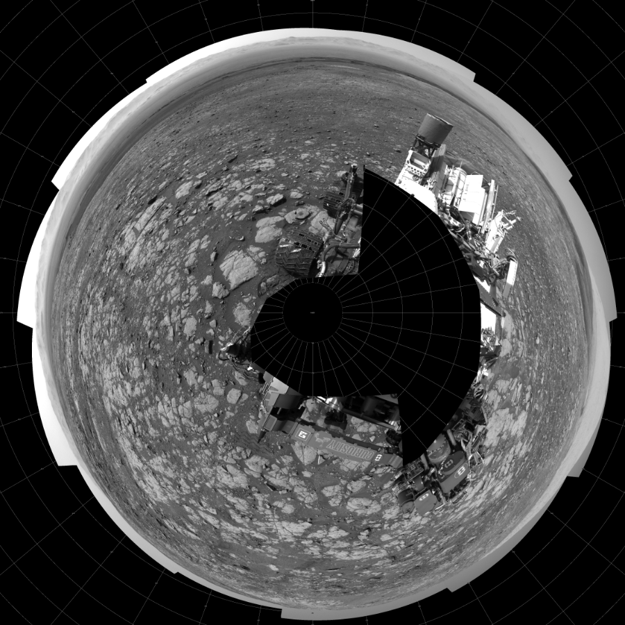 NASA's Mars rover Curiosity took 19 images in Gale Crater using its mast-mounted Left Navigation Camera (Navcam) to create this mosaic. The seam-corrected mosaic provides a polar stereographic projection panorama of the Martian surface with 0 degrees azimuth (measured clockwise from north) at the top of the image. Curiosity took the images on March 26, 2018, Sol 2003 of the Mars Science Laboratory mission at drive 0, site number 69. The local mean solar time for the image exposures was 2 PM. Each Navcam image has a 45-degree field of view. CREDIT: NASA/JPL-Caltech
