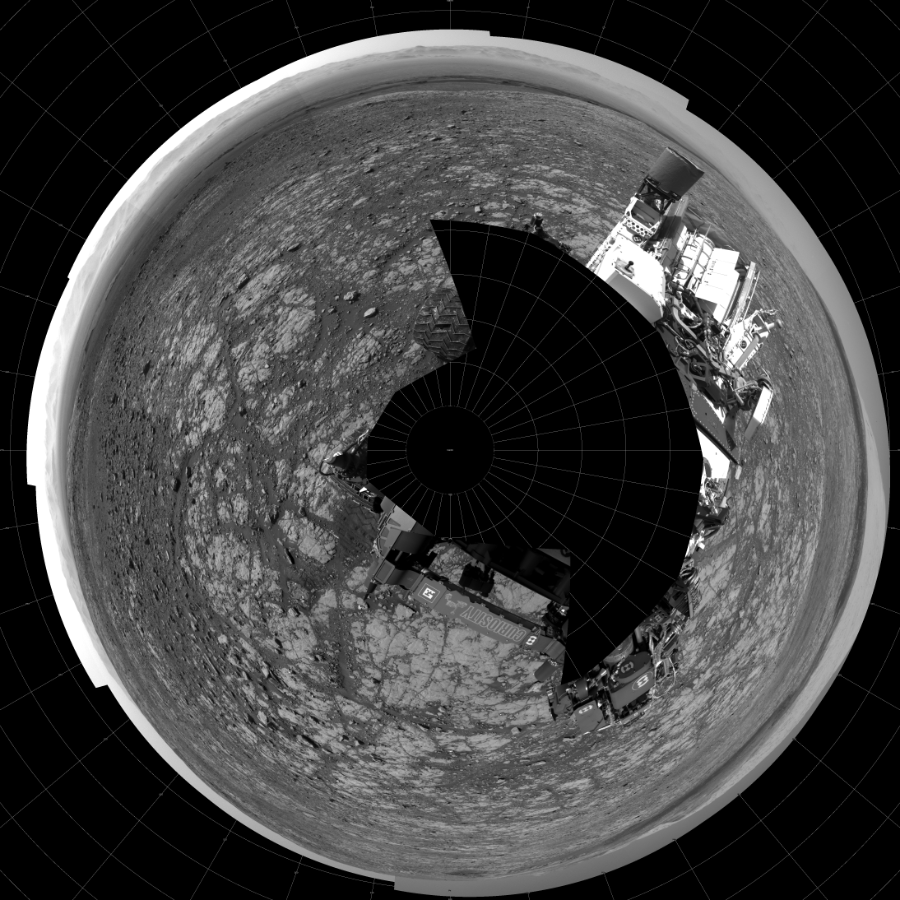 NASA's Mars rover Curiosity took 18 images in Gale Crater using its mast-mounted Left Navigation Camera (Navcam) to create this mosaic. The seam-corrected mosaic provides a polar stereographic projection panorama of the Martian surface with 0 degrees azimuth (measured clockwise from north) at the top of the image. Curiosity took the images on March 27, 2018, Sol 2004 of the Mars Science Laboratory mission at drive 408, site number 69. The local mean solar time for the image exposures was from 1 PM to 3 PM. Each Navcam image has a 45-degree field of view. CREDIT: NASA/JPL-Caltech