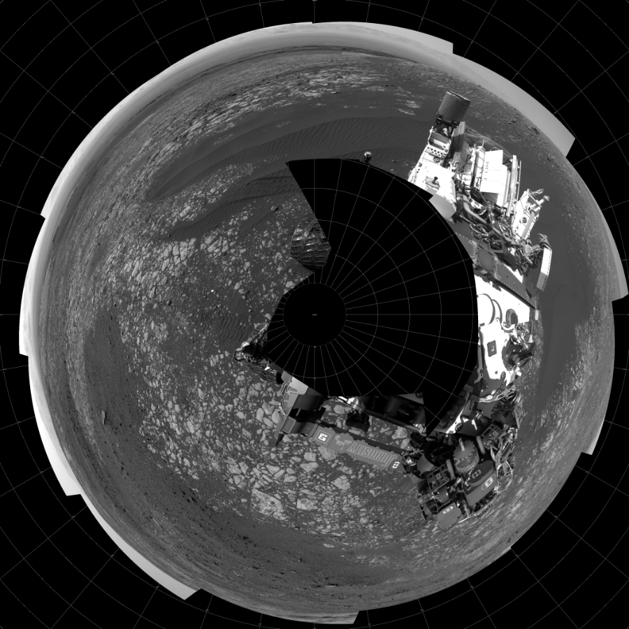 NASA's Mars rover Curiosity took 18 images in Gale Crater using its mast-mounted Left Navigation Camera (Navcam) to create this mosaic. The seam-corrected mosaic provides a polar stereographic projection panorama of the Martian surface with 0 degrees azimuth (measured clockwise from north) at the top of the image. Curiosity took the images on April 04, 2018, Sol 2012 of the Mars Science Laboratory mission at drive 1384, site number 69. The local mean solar time for the image exposures was 2 PM. Each Navcam image has a 45-degree field of view. CREDIT: NASA/JPL-Caltech