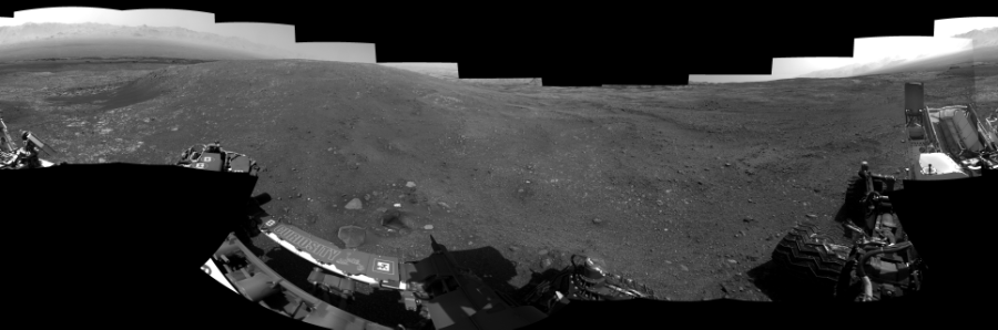 NASA's Mars rover Curiosity took 19 images in Gale Crater using its mast-mounted Left Navigation Camera (Navcam) to create this mosaic. The seam-corrected mosaic provides a 360-degree cylindrical-perspective projection panorama of the Martian surface suitable for stereo viewing, centered at 39 degrees azimuth (measured clockwise from north). This single-eye view must be combined with the partner right image to be viewed in stereo.  Curiosity took the images on April 07, 2018, Sol 2014 of the Mars Science Laboratory mission at drive 1552, site number 69. The local mean solar time for the image exposures was 3 PM. Each Navcam image has a 45-degree field of view. CREDIT: NASA/JPL-Caltech