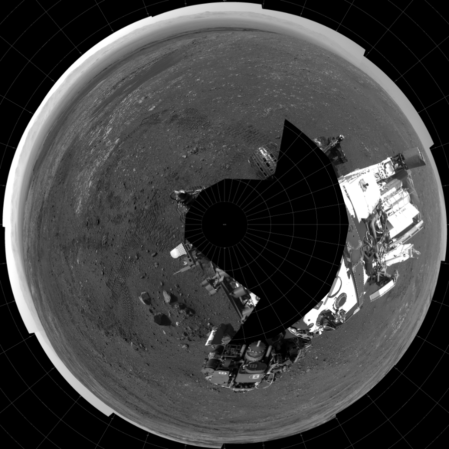 NASA's Mars rover Curiosity took 17 images in Gale Crater using its mast-mounted Left Navigation Camera (Navcam) to create this mosaic. The seam-corrected mosaic provides a polar stereographic projection panorama of the Martian surface with 0 degrees azimuth (measured clockwise from north) at the top of the image. Curiosity took the images on April 10, 2018, Sol 2017 of the Mars Science Laboratory mission at drive 1648, site number 69. The local mean solar time for the image exposures was 2 PM. Each Navcam image has a 45-degree field of view. CREDIT: NASA/JPL-Caltech