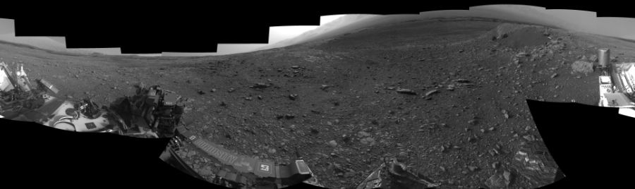 NASA's Mars rover Curiosity took 17 images in Gale Crater using its mast-mounted Left Navigation Camera (Navcam) to create this mosaic. The seam-corrected mosaic provides a 360-degree cylindrical-perspective projection panorama of the Martian surface suitable for stereo viewing, centered at 26 degrees azimuth (measured clockwise from north). This single-eye view must be combined with the partner right image to be viewed in stereo.  Curiosity took the images on April 25, 2018, Sol 2032 of the Mars Science Laboratory mission at drive 2766, site number 69. The local mean solar time for the image exposures was from 3 PM to 4 PM. Each Navcam image has a 45-degree field of view. CREDIT: NASA/JPL-Caltech