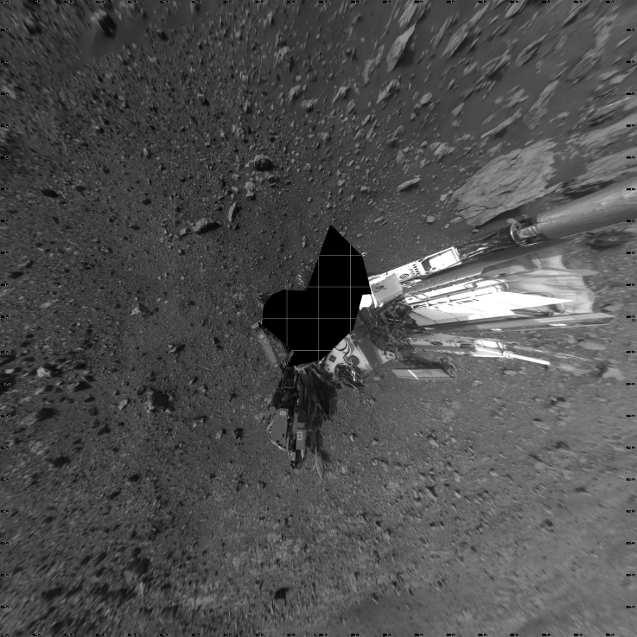 NASA's Mars rover Curiosity took 17 images in Gale Crater using its mast-mounted Left Navigation Camera (Navcam) to create this mosaic. The seam-corrected mosaic provides a vertical projection of the Martian surface near the rover, covering an area of 20 meters (north/south) by 20 meters (east/west). North is up in the image. This projection provides an overhead view, but introduces distortion for items not on the surface, such as large rocks and the rover itself.  Curiosity took the images on April 25, 2018, Sol 2032 of the Mars Science Laboratory mission at drive 2766, site number 69. The local mean solar time for the image exposures was from 3 PM to 4 PM. Each Navcam image has a 45-degree field of view. CREDIT: NASA/JPL-Caltech