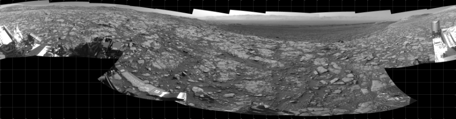 NASA's Mars rover Curiosity took 17 images in Gale Crater using its mast-mounted Left Navigation Camera (Navcam) to create this mosaic. The seam-corrected mosaic provides a 360-degree cylindrical projection panorama of the Martian surface centered at 280 degrees azimuth (measured clockwise from north). Curiosity took the images on May 03, 2018, Sol 2040 of the Mars Science Laboratory mission at drive 886, site number 70. The local mean solar time for the image exposures was from 2 PM to 3 PM. Each Navcam image has a 45 degree field of view. CREDIT: NASA/JPL-Caltech