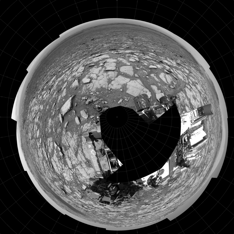 NASA's Mars rover Curiosity took 19 images in Gale Crater using its mast-mounted Left Navigation Camera (Navcam) to create this mosaic. The seam-corrected mosaic provides a polar stereographic projection panorama of the Martian surface with 0 degrees azimuth (measured clockwise from north) at the top of the image. Curiosity took the images on May 07, 2018, Sol 2044 of the Mars Science Laboratory mission at drive 1138, site number 70. The local mean solar time for the image exposures was 1 PM. Each Navcam image has a 45-degree field of view. CREDIT: NASA/JPL-Caltech