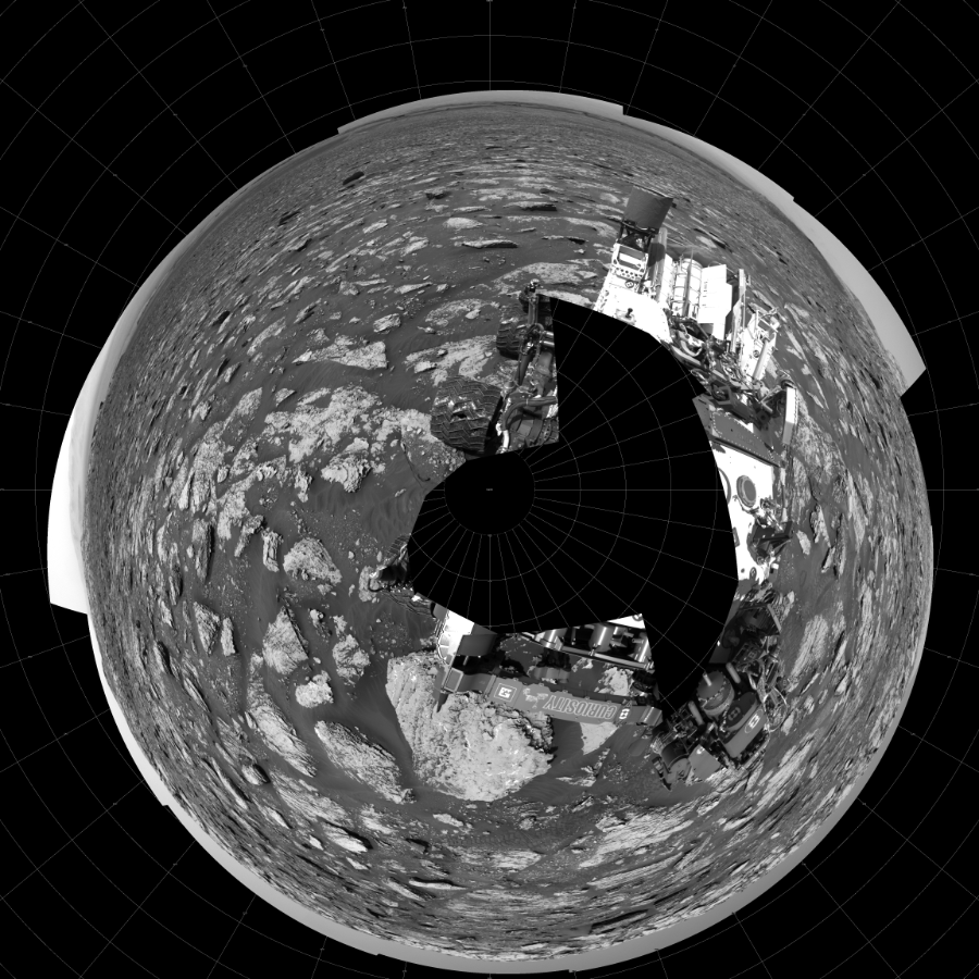 NASA's Mars rover Curiosity took 19 images in Gale Crater using its mast-mounted Left Navigation Camera (Navcam) to create this mosaic. The seam-corrected mosaic provides a polar stereographic projection panorama of the Martian surface with 0 degrees azimuth (measured clockwise from north) at the top of the image. Curiosity took the images on May 10, 2018, Sol 2047 of the Mars Science Laboratory mission at drive 1538, site number 70. The local mean solar time for the image exposures was 1 PM. Each Navcam image has a 45-degree field of view. CREDIT: NASA/JPL-Caltech