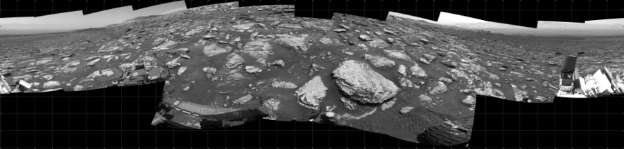 NASA's Mars rover Curiosity took 17 images in Gale Crater using its mast-mounted Left Navigation Camera (Navcam) to create this mosaic. The seam-corrected mosaic provides a 360-degree cylindrical projection panorama of the Martian surface centered at 180 degrees azimuth (measured clockwise from north). Curiosity took the images on May 15, 2018, Sol 2051 of the Mars Science Laboratory mission at drive 1554, site number 70. The local mean solar time for the image exposures was 1 PM. Each Navcam image has a 45 degree field of view. CREDIT: NASA/JPL-Caltech