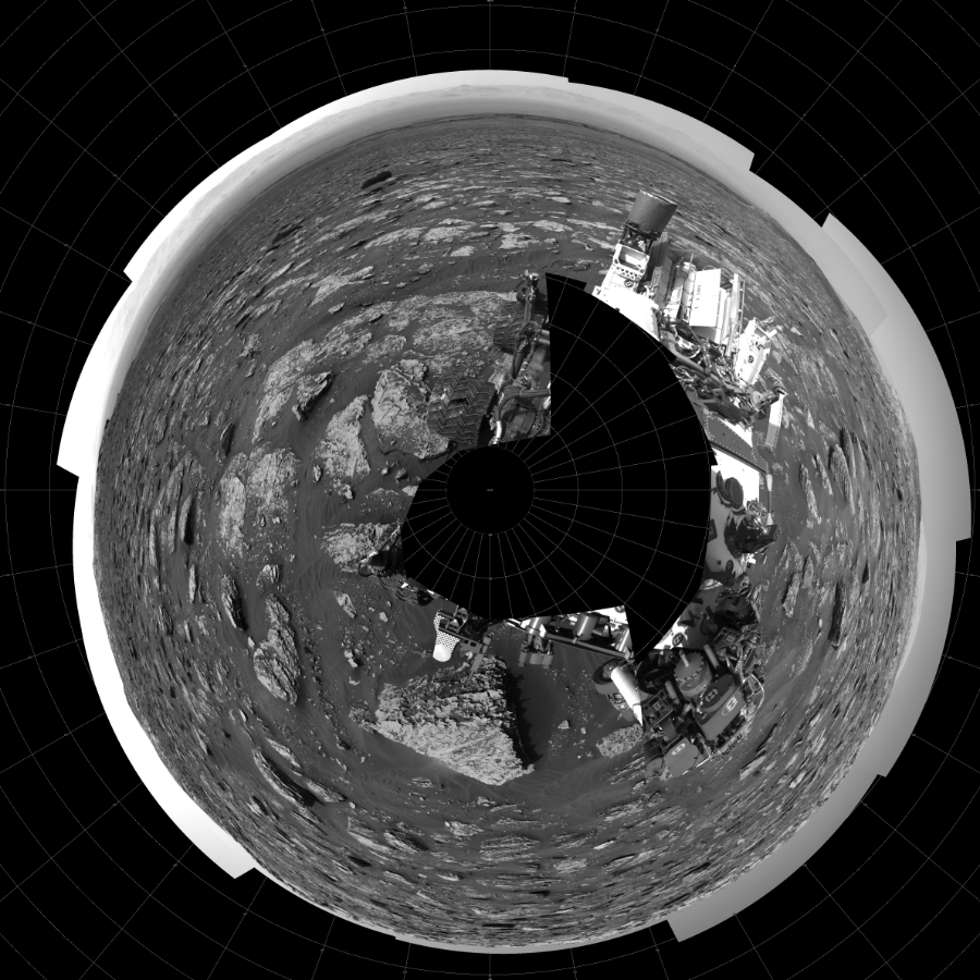 NASA's Mars rover Curiosity took 22 images in Gale Crater using its mast-mounted Left Navigation Camera (Navcam) to create this mosaic. The seam-corrected mosaic provides a polar stereographic projection panorama of the Martian surface with 0 degrees azimuth (measured clockwise from north) at the top of the image. Curiosity took the images on May 21, 2018, Sols 2057-2056 of the Mars Science Laboratory mission at drive 1752, site number 70. The local mean solar time for the image exposures was 2 PM. Each Navcam image has a 45-degree field of view. CREDIT: NASA/JPL-Caltech