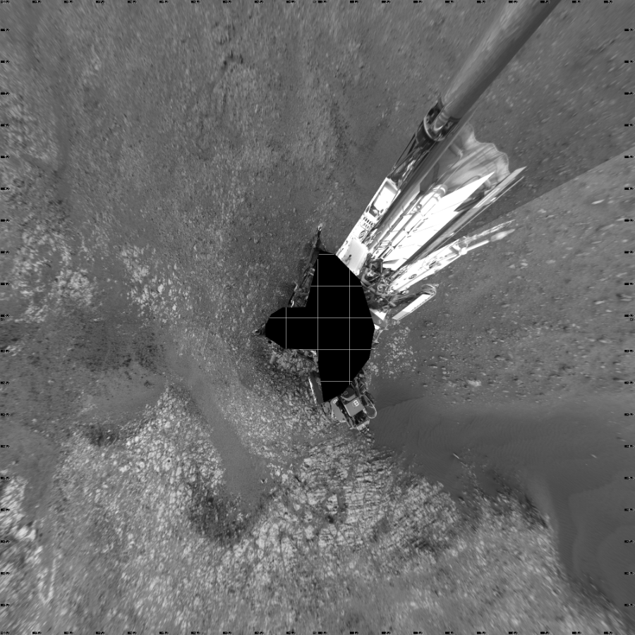 NASA's Mars rover Curiosity took 19 images in Gale Crater using its mast-mounted Left Navigation Camera (Navcam) to create this mosaic. The seam-corrected mosaic provides a vertical projection of the Martian surface near the rover, covering an area of 20 meters (north/south) by 20 meters (east/west). North is up in the image. This projection provides an overhead view, but introduces distortion for items not on the surface, such as large rocks and the rover itself.  Curiosity took the images on September 07, 2018, Sol 2163 of the Mars Science Laboratory mission at drive 2410, site number 72. The local mean solar time for the image exposures was 3 PM. Each Navcam image has a 45-degree field of view. CREDIT: NASA/JPL-Caltech