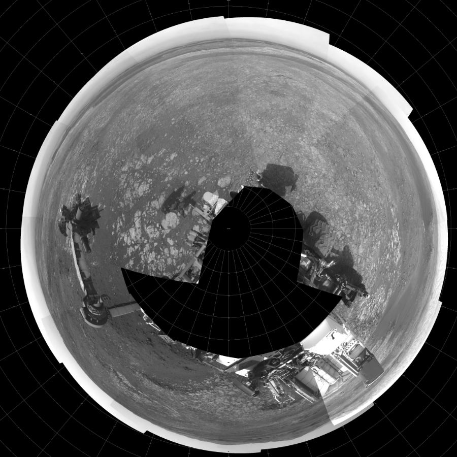 NASA's Mars rover Curiosity took 21 images in Gale Crater using its mast-mounted Left Navigation Camera (Navcam) to create this mosaic. The seam-corrected mosaic provides a polar stereographic projection panorama of the Martian surface with 0 degrees azimuth (measured clockwise from north) at the top of the image. Curiosity took the images on October 29, 2018, Sols 2214-2218 of the Mars Science Laboratory mission at drive 0, site number 73. The local mean solar time for the image exposures was from 2 PM to 4 PM. Each Navcam image has a 45-degree field of view. CREDIT: NASA/JPL-Caltech