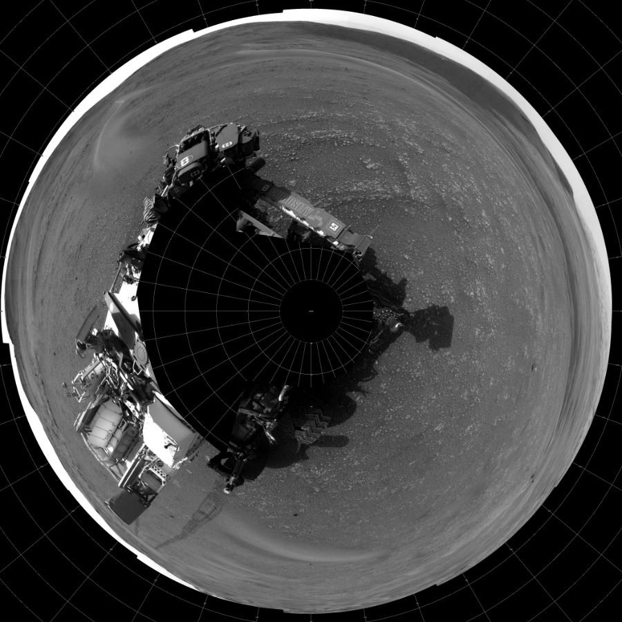 NASA's Mars rover Curiosity took 18 images in Gale Crater using its mast-mounted Left Navigation Camera (Navcam) to create this mosaic. The seam-corrected mosaic provides a polar stereographic projection panorama of the Martian surface with 0 degrees azimuth (measured clockwise from north) at the top of the image. Curiosity took the images on March 27, 2019, Sol 2359 of the Mars Science Laboratory mission at drive 936, site number 75. The local mean solar time for the image exposures was 3 PM. Each Navcam image has a 45-degree field of view. CREDIT: NASA/JPL-Caltech