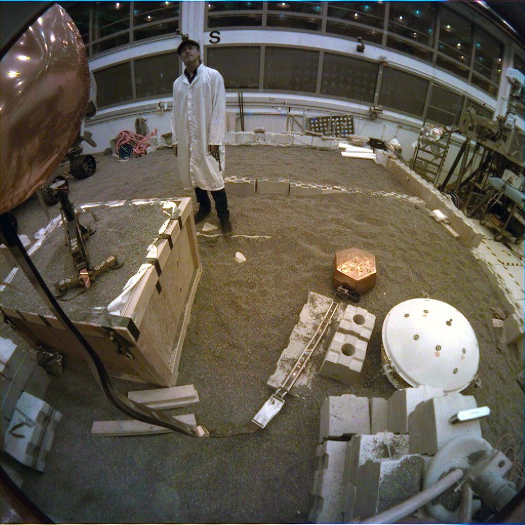In a Mars-like environment at NASA's Jet Propulsion Laboratory, the fish-eye instrument context camera aboard NASA's InSight lander snapped this image of the actor Brad Pitt on Sept. 6, 2019. Pitt visited JPL to learn about real space technology after filming his space-themed movie "Ad Astra."
