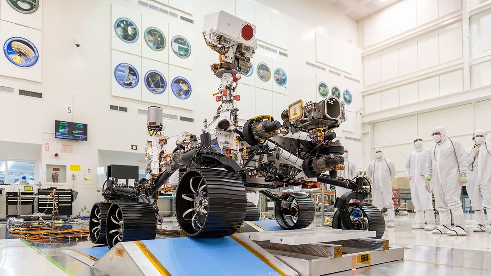 In a clean room at NASA's Jet Propulsion Laboratory in Pasadena, California, engineers observed the first driving test for NASA's Mars 2020 rover on Dec. 17, 2019.