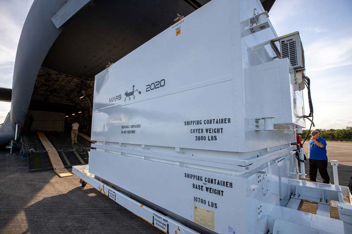 The Mars 2020 rover is offloaded from a C-17 aircraft at the Launch and Landing Facility, formerly known as the Shuttle Landing Facility, at NASA’s Kennedy Space Center on Feb. 12, 2020.