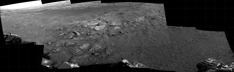 NASA's Mars rover Curiosity took 10 images in Gale Crater using its mast-mounted Right Navigation Camera (Navcam) to create this mosaic. The seam-corrected mosaic provides a 238-degree cylindrical projection panorama of the Martian surface centered at 160 degrees azimuth (measured clockwise from north). Curiosity took the images on November 30, 2020, Sol 2956 of the Mars Science Laboratory mission at drive 0, site number 84. The local mean solar time for the image exposures was 4 PM. Each Navcam image has a 45 degree field of view. CREDIT: NASA/JPL-Caltech