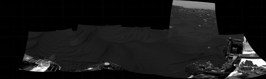 NASA's Mars rover Curiosity took 8 images in Gale Crater using its mast-mounted Right Navigation Camera (Navcam) to create this mosaic. The seam-corrected mosaic provides a 267-degree cylindrical projection panorama of the Martian surface centered at 221 degrees azimuth (measured clockwise from north). Curiosity took the images on January 04, 2021, Sol 2991 of the Mars Science Laboratory mission at drive 2120, site number 84. The local mean solar time for the image exposures was from 1 PM to 12 PM. Each Navcam image has a 45 degree field of view. CREDIT: NASA/JPL-Caltech