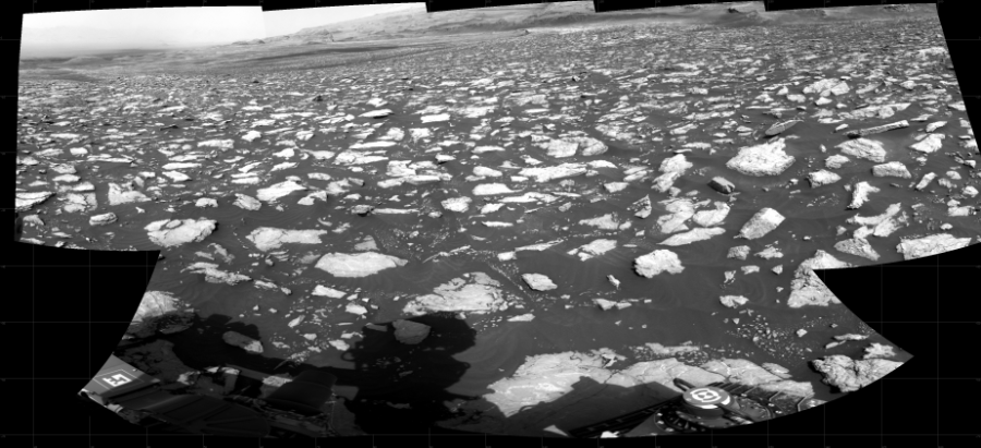 NASA's Mars rover Curiosity took 7 images in Gale Crater using its mast-mounted Right Navigation Camera (Navcam) to create this mosaic. The seam-corrected mosaic provides a 174-degree cylindrical projection panorama of the Martian surface centered at 101 degrees azimuth (measured clockwise from north). Curiosity took the images on February 08, 2021, Sol 3025 of the Mars Science Laboratory mission at drive 480, site number 86. The local mean solar time for the image exposures was 3 PM. Each Navcam image has a 45 degree field of view. CREDIT: NASA/JPL-Caltech