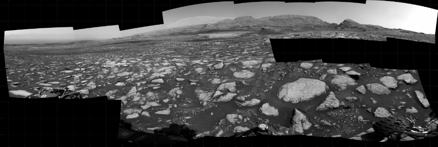 NASA's Mars rover Curiosity took 15 images in Gale Crater using its mast-mounted Right Navigation Camera (Navcam) to create this mosaic. The seam-corrected mosaic provides a 270-degree cylindrical projection panorama of the Martian surface centered at 120 degrees azimuth (measured clockwise from north). Curiosity took the images on February 10, 2021, Sol 3027 of the Mars Science Laboratory mission at drive 978, site number 86. The local mean solar time for the image exposures was from 2 PM to 3 PM. Each Navcam image has a 45 degree field of view. CREDIT: NASA/JPL-Caltech