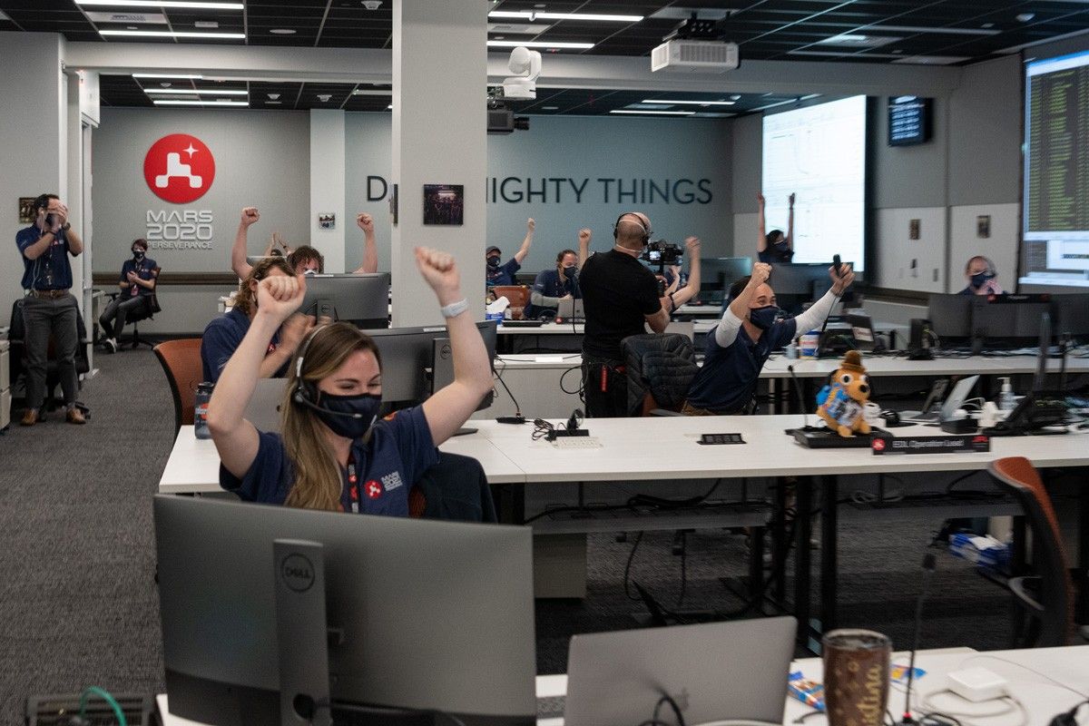 Team members inside a mission support area at NASA's Jet Propulsion Laboratory in Southern California