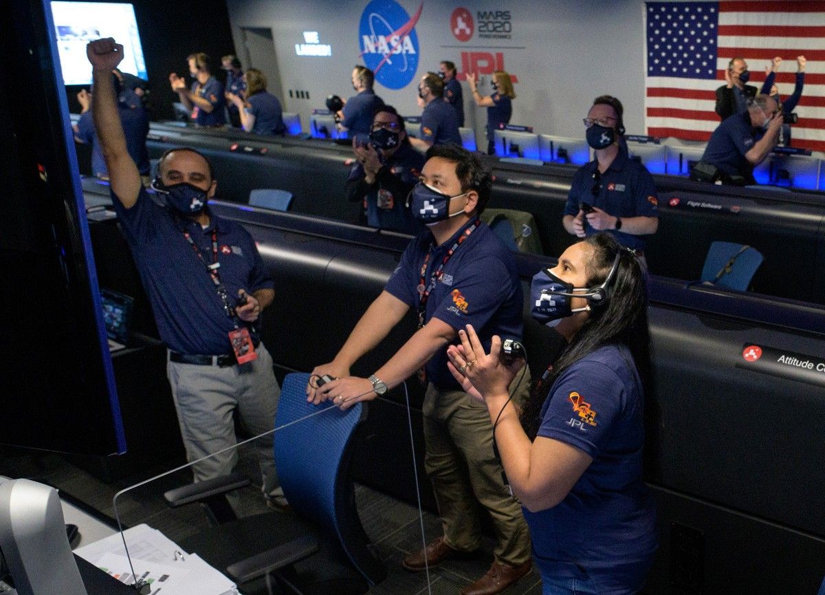Perseverance team members eagerly watching the rover arrival on Mars