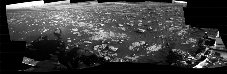 NASA's Mars rover Curiosity took 14 images in Gale Crater using its mast-mounted Right Navigation Camera (Navcam) to create this mosaic. The seam-corrected mosaic provides a 253-degree cylindrical projection panorama of the Martian surface centered at 156 degrees azimuth (measured clockwise from north). Curiosity took the images on February 26, 2021, Sol 3042 of the Mars Science Laboratory mission at drive 2596, site number 86. The local mean solar time for the image exposures was 5 PM. Each Navcam image has a 45 degree field of view. CREDIT: NASA/JPL-Caltech